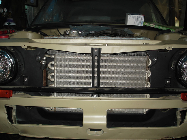 air conditioner condenser mounted in car