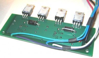 mount D100, D103, and the bigger transistors to the bottom of the board like this...