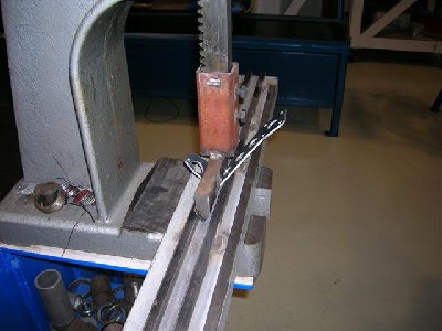 Our make shift, but very effective arbor press brake here making the bend in the bracket.