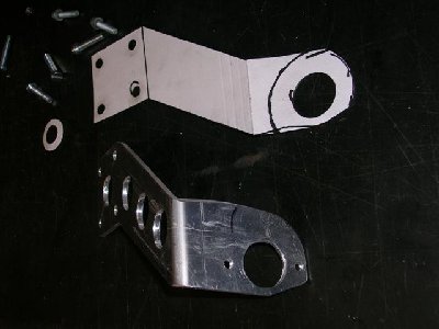 Here is the bracket, cut out, bent, drilled, tapped, filed and finished.